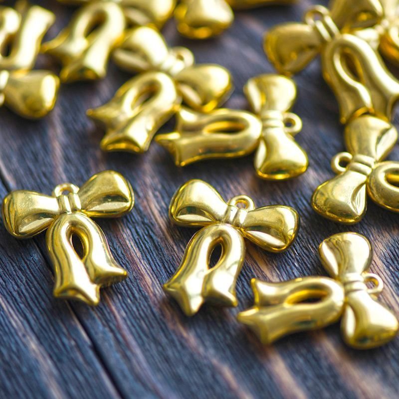 подвеска акриловая "бантик", цвет золото, 29.5x26x5.5 мм