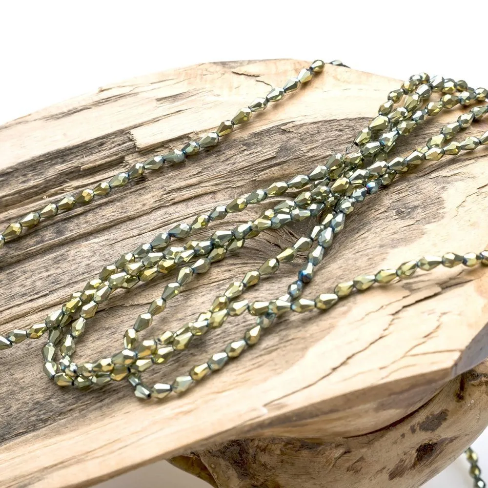 бусина "капля", граненая, стекло, цвет зеленый металлик, 5х3мм