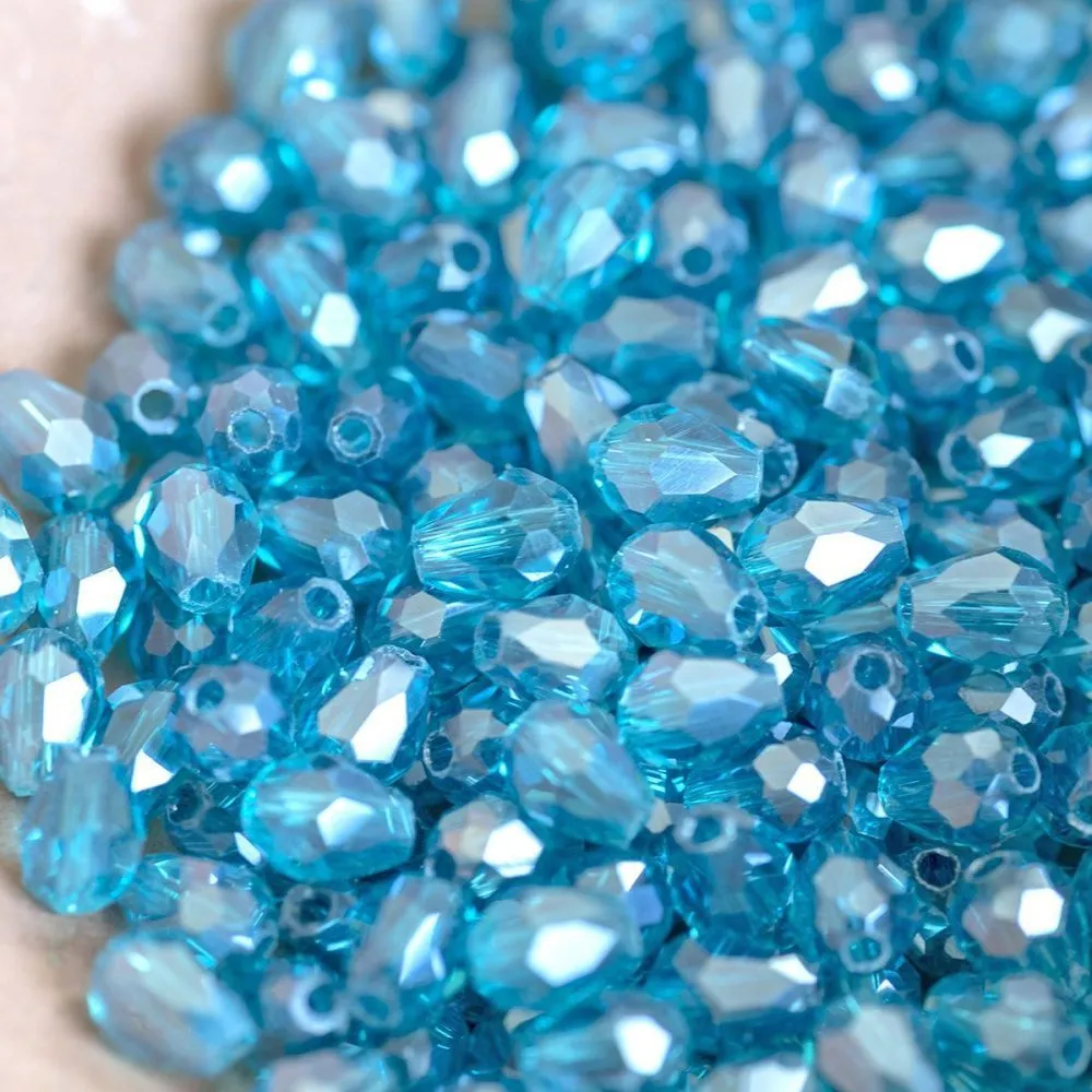 бусина "капля", граненая, стекло, цвет бирюзовый радужный, 6х4мм