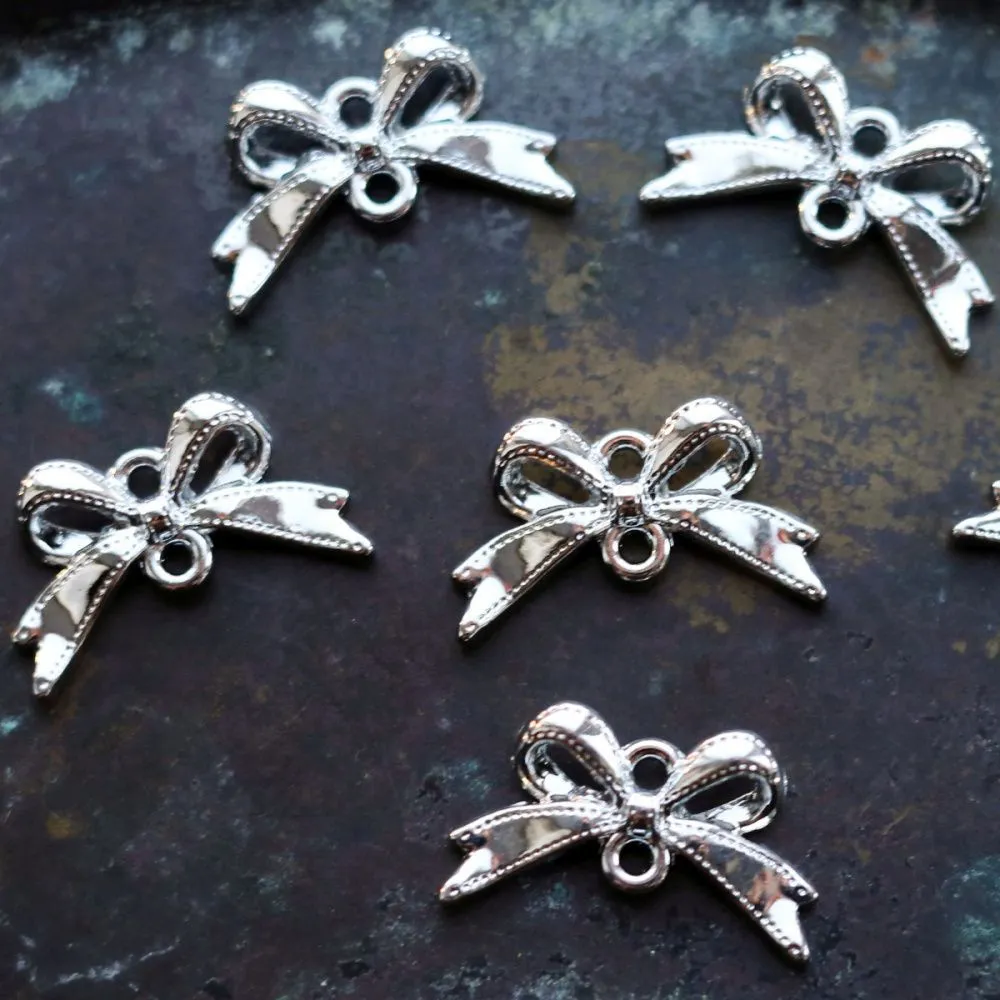 коннектор "бант", цвет платина, 20х12х3.5 мм